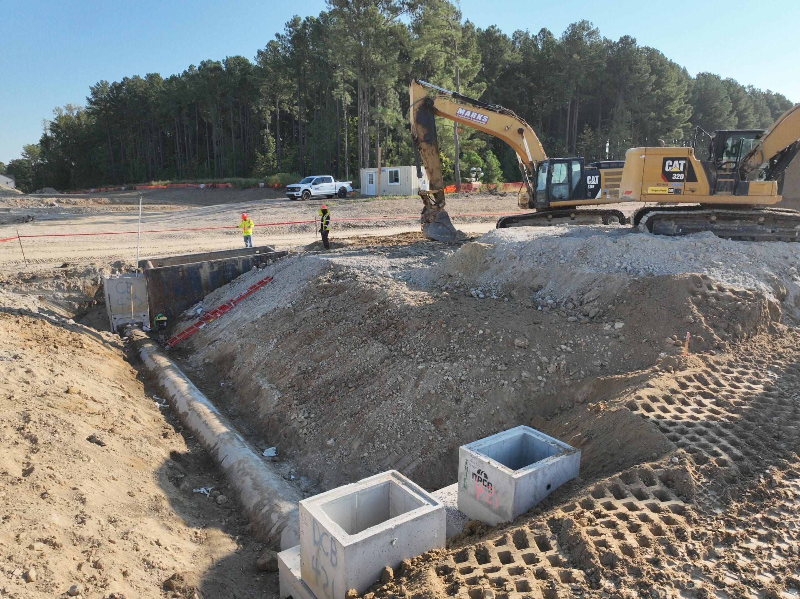 Utility structure being set by a Marks crew